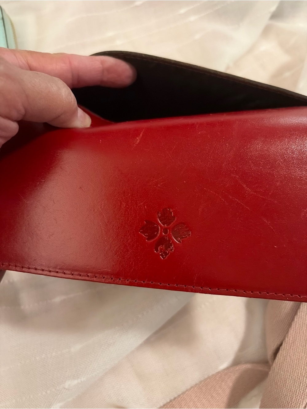 Red Leather Clutch with Embossed Floral Motif Patricia Nash